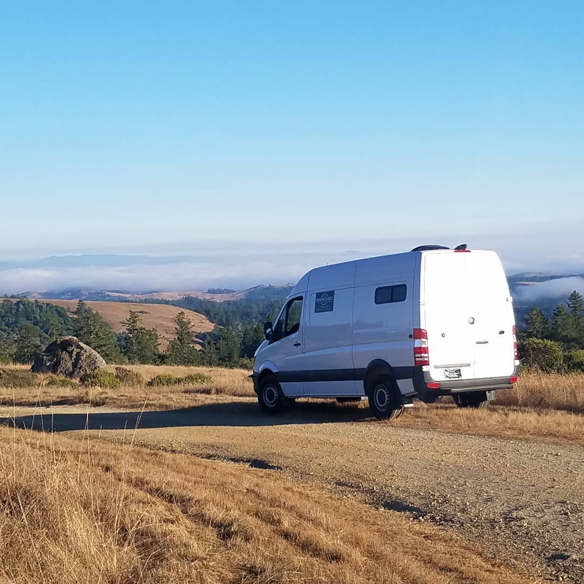 An Enriched Sprinter conversion parked on a Sonoma County ridge