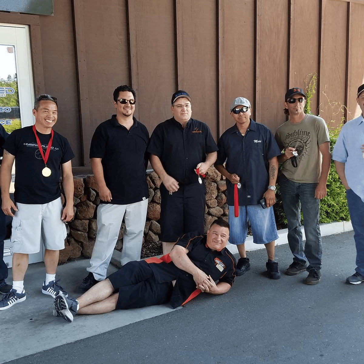 The Enriched crew outside the shop
